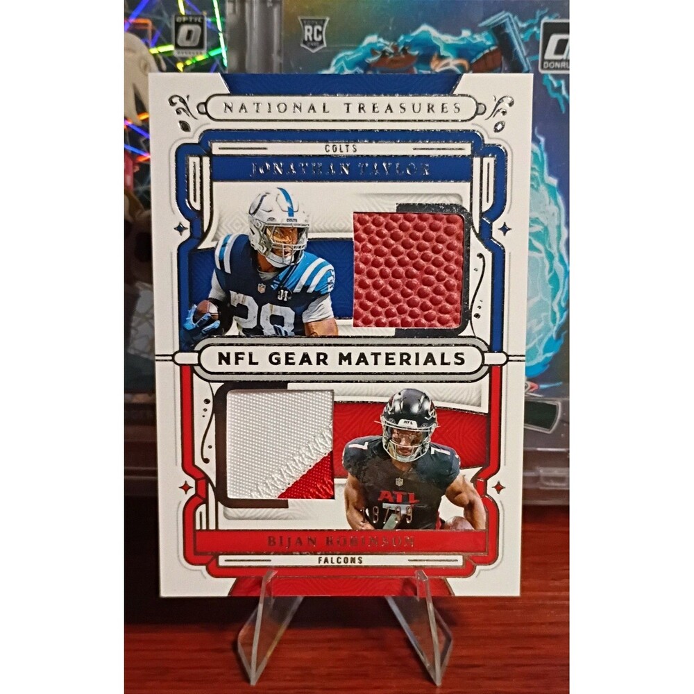 2025 Panini National Treasures - Nfl Gear Jonathan Taylor, Bijan Robinson 18/99